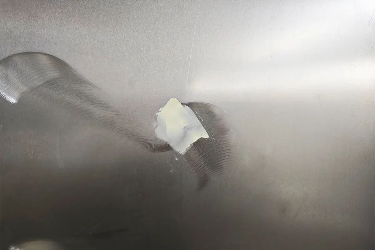 Sheet welding point trimming